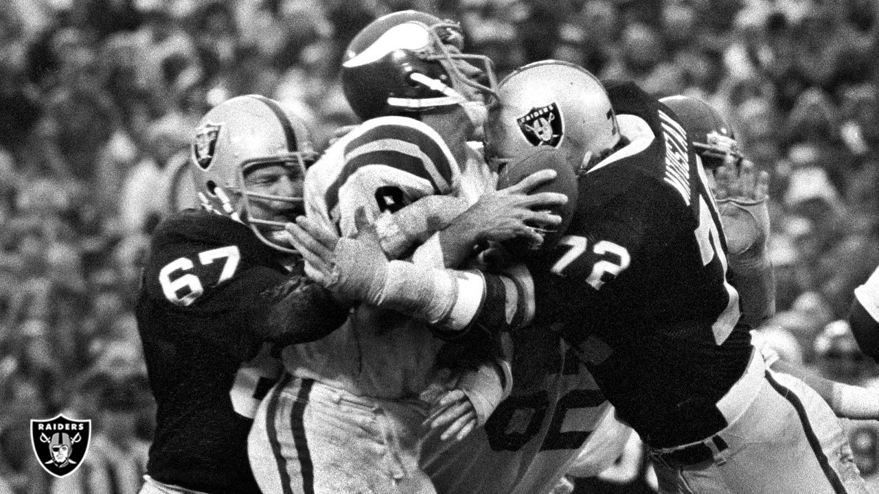 Oakland Raiders defensive tackle John Matuszak waits his turn on