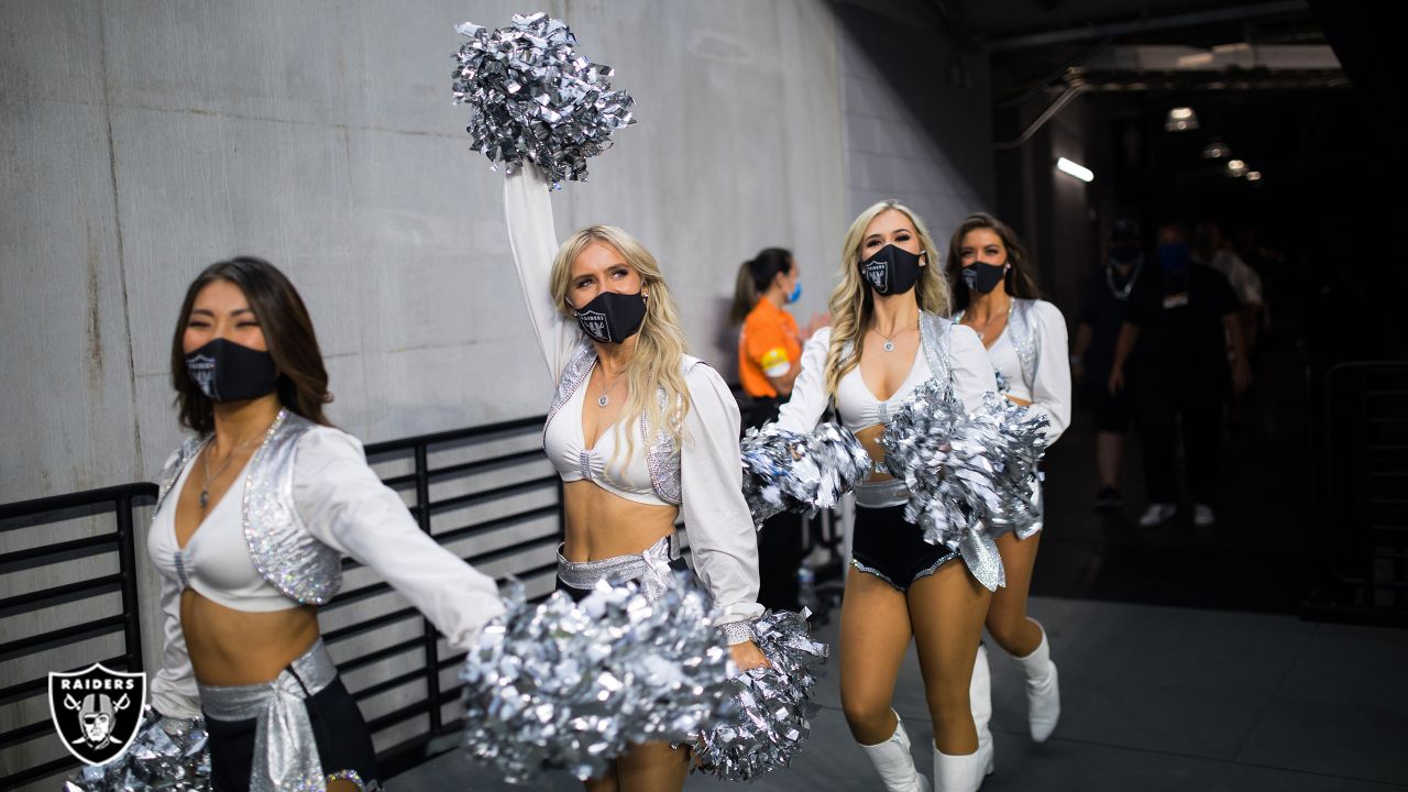 Las Vegas Raiders cheerleaders cheer during an NFL preseason