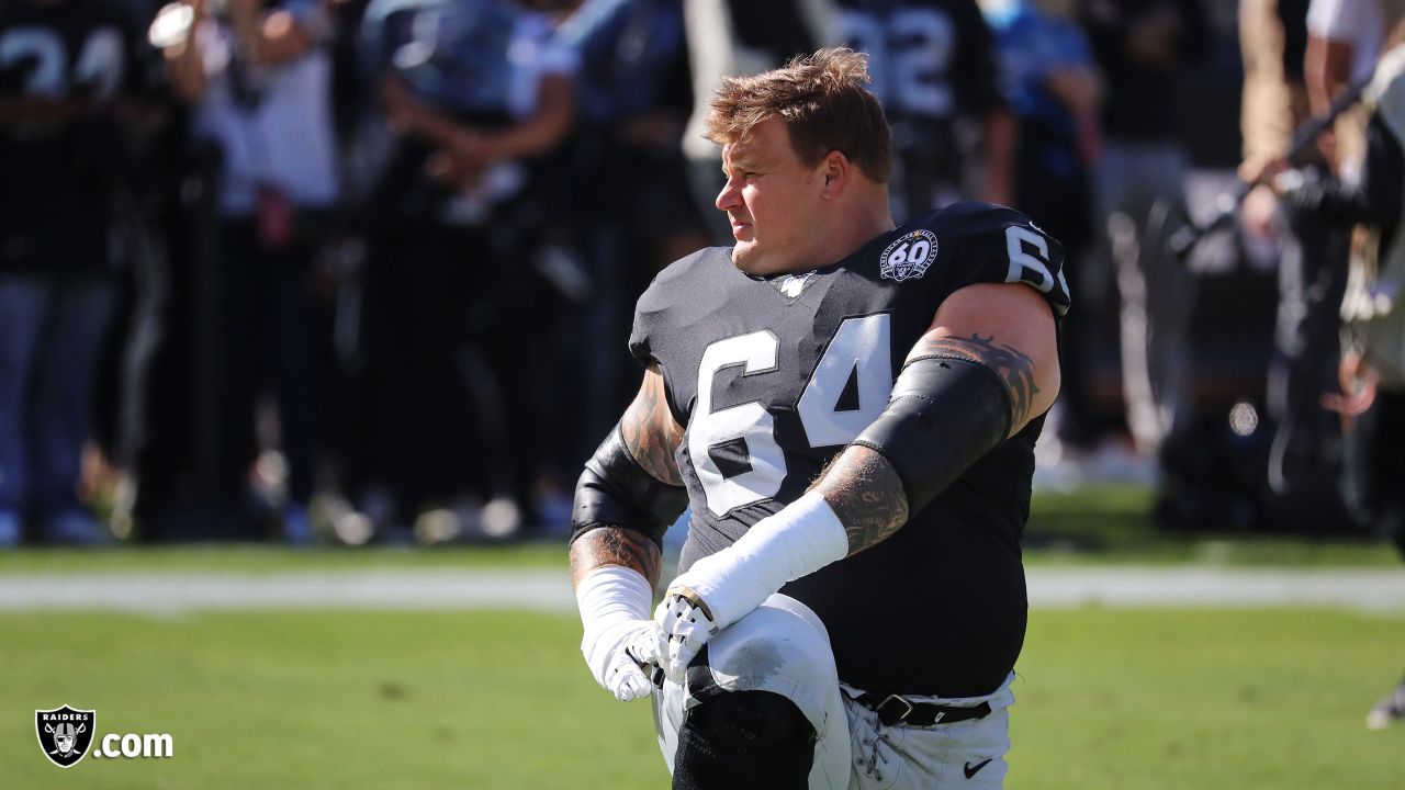 Las Vegas Raiders guard Richie Incognito (64) hugs Los Angeles