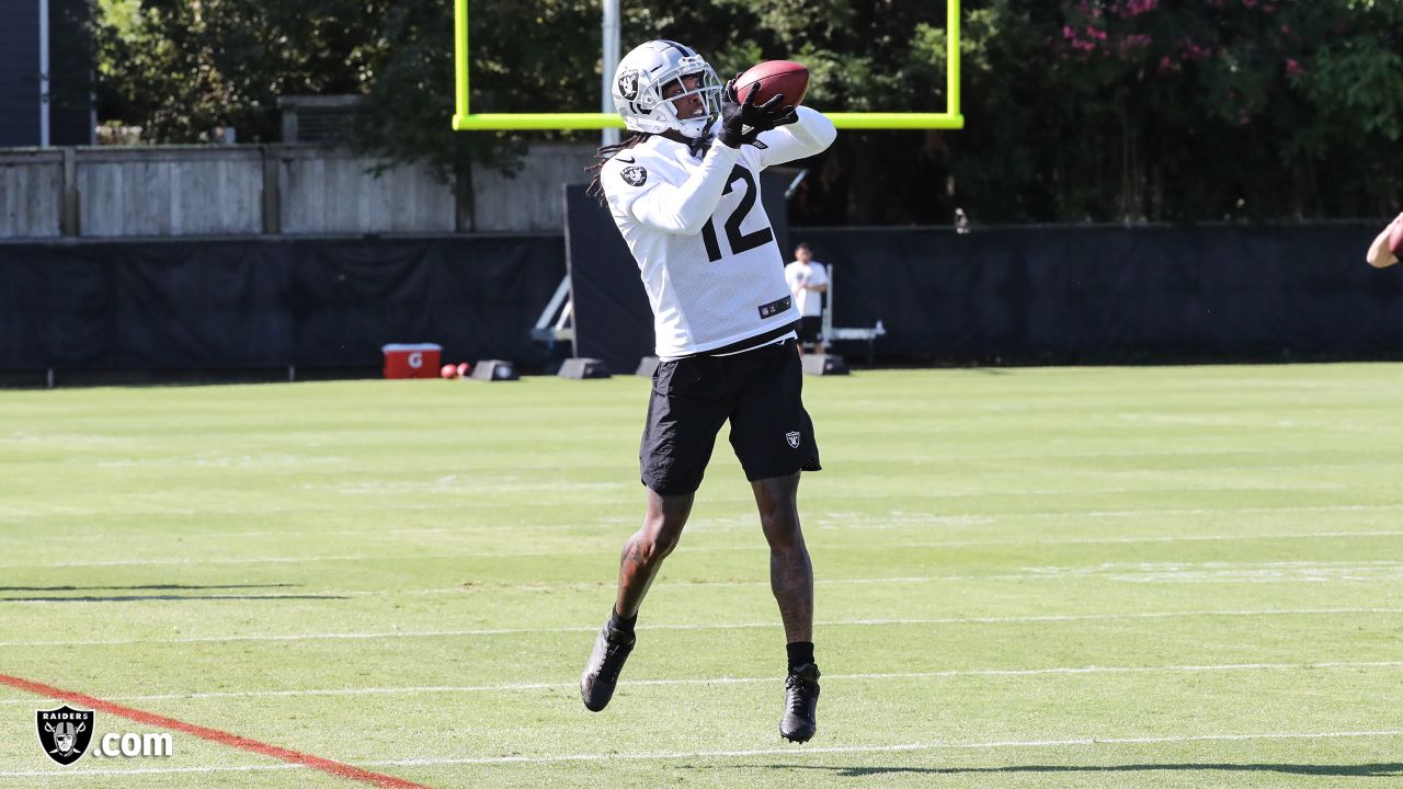 Oakland Raiders wide receiver Martavis Bryant (12) tries to break