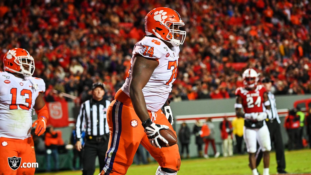 Raiders trade up to select Clemson offensive guard John Simpson