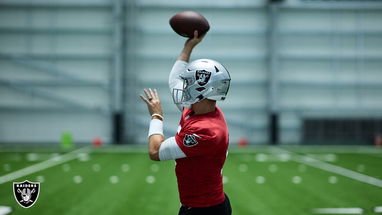 Oakland Raiders Quarterback Derek Carr throws a pass during practice at  their training facility in Napa Valley, Calif., August 7, 2018. The Raiders  invited Travis Air Force Base Airmen to attend camp