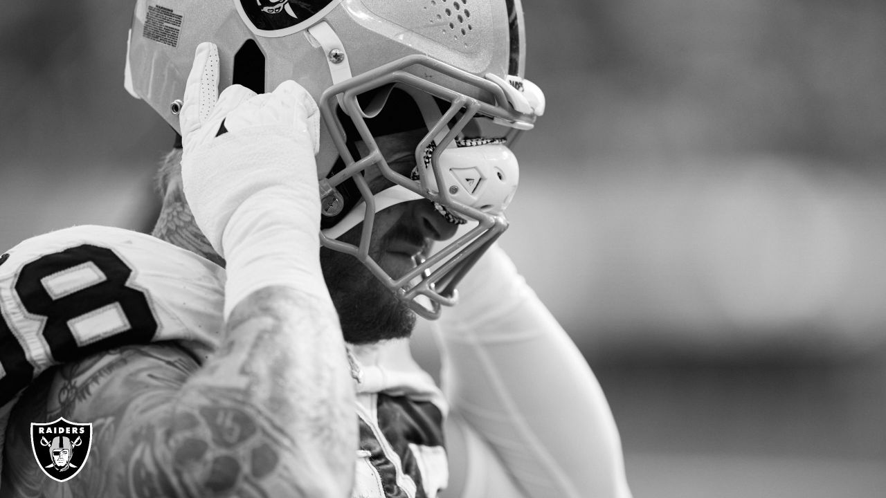 half black half white raiders jersey