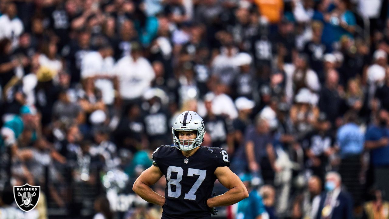 Las Vegas Raiders tight end Foster Moreau (87) is tackled by Miami