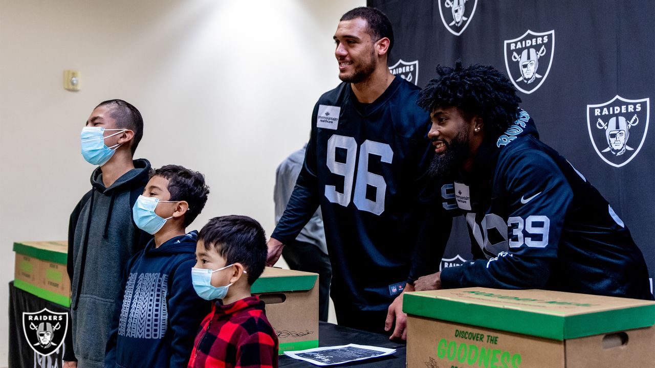 Las Vegas Raiders defensive end Tashawn Bower (96) takes a break