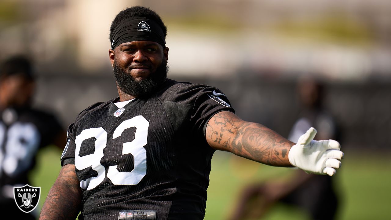 NASHVILLE, TN - SEPTEMBER 25: Las Vegas Raiders offensive tackle Thayer  Munford Jr. (77) looks on during warmups before the game between the  Tennessee Titans and the Las Vegas Raiders on September