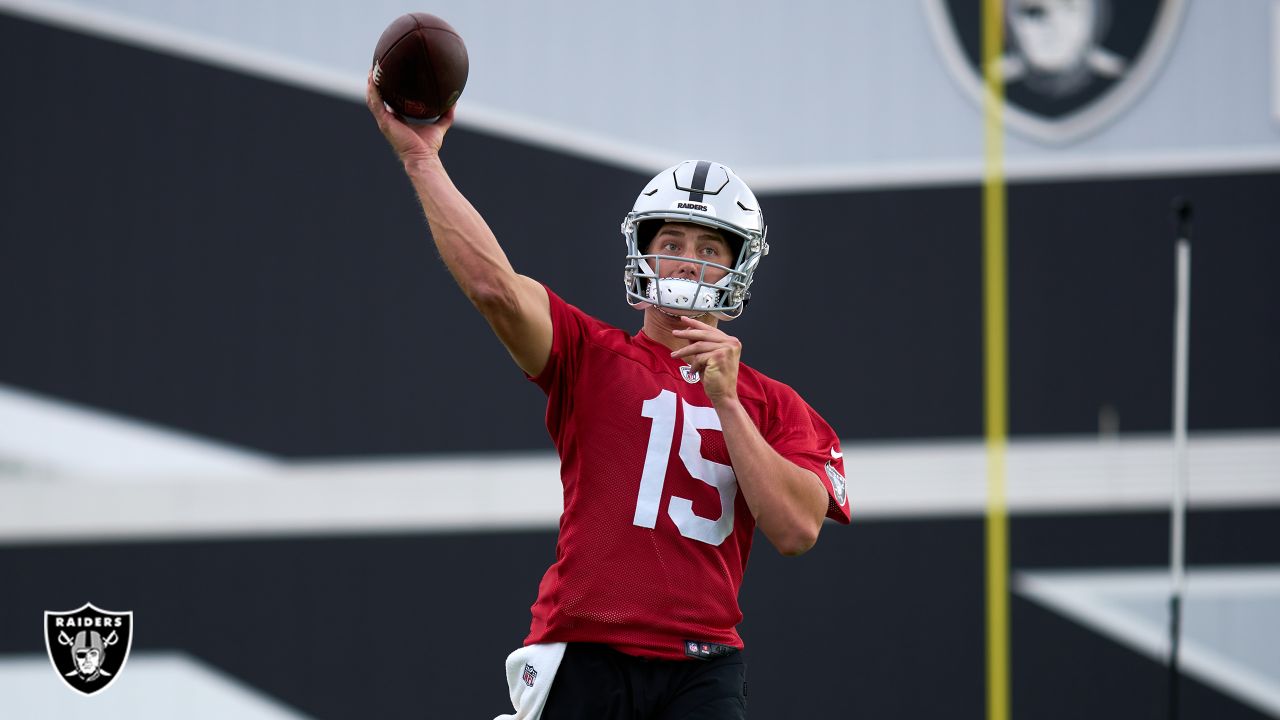 Las Vegas Raiders quarterback Chase Garbers (14) prepares to throw