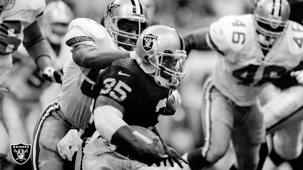 Oakland, California, USA. 7th Dec, 1980. Oakland Raiders vs Dallas Cowboys  at Oakland-Alameda County Coliseum Sunday, December 7, 1980 Oakland Running  back Mark Van Eeghen pushes for extra yardage. Raiders lost to