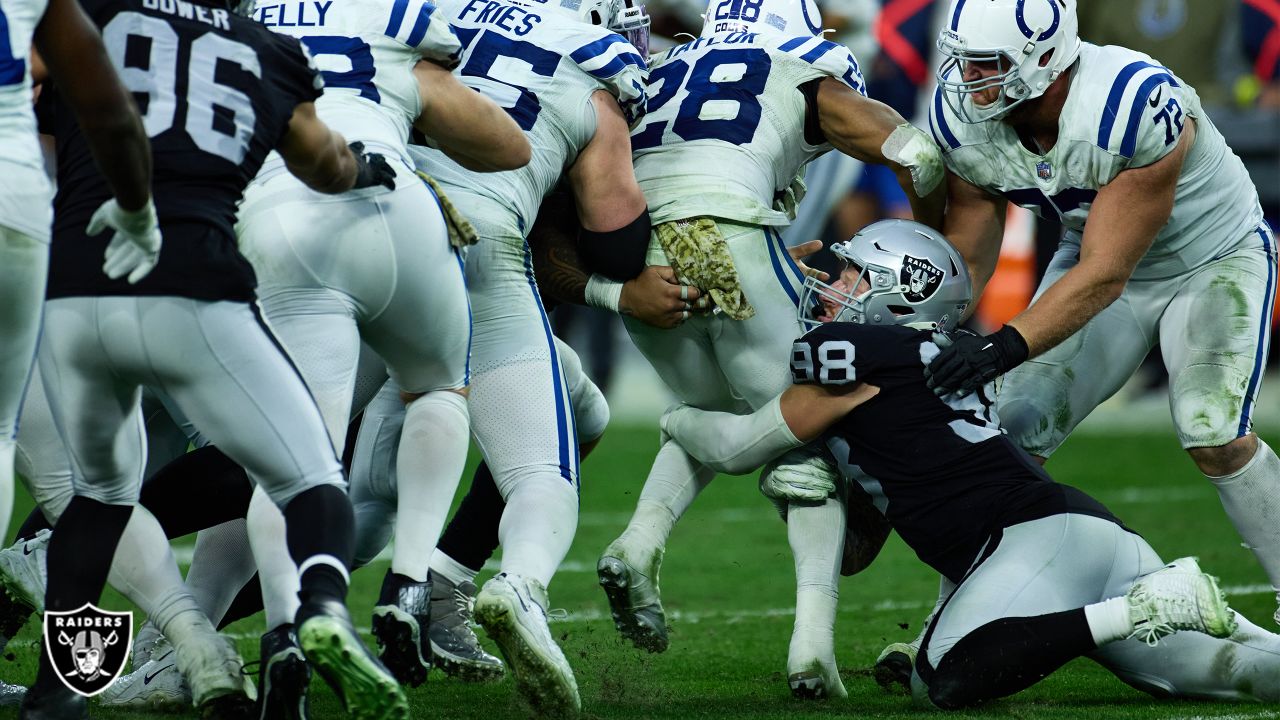 Las Vegas Raiders defensive end Maxx Crosby puts clamps on Los Angeles Rams  quarterback Baker Mayfield in a hurry for TFL on busted play