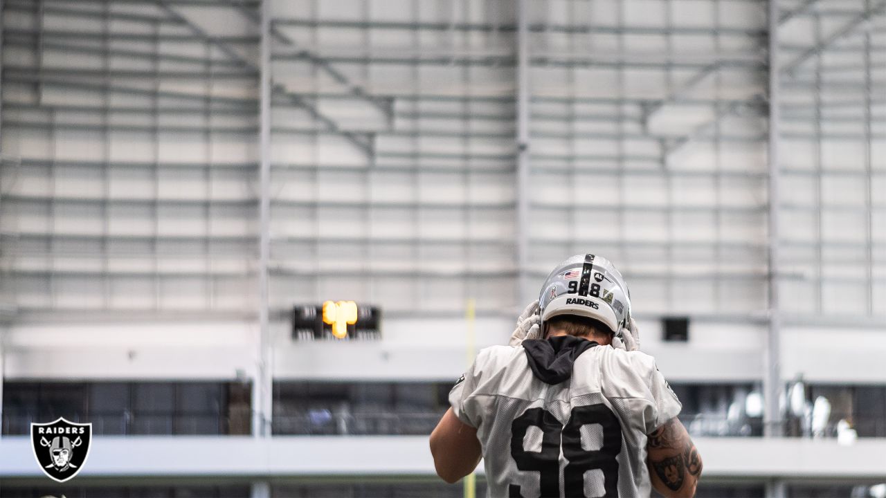 Raiders running back Devontae Booker (23) warms up before the start of an  NFL football game aga …