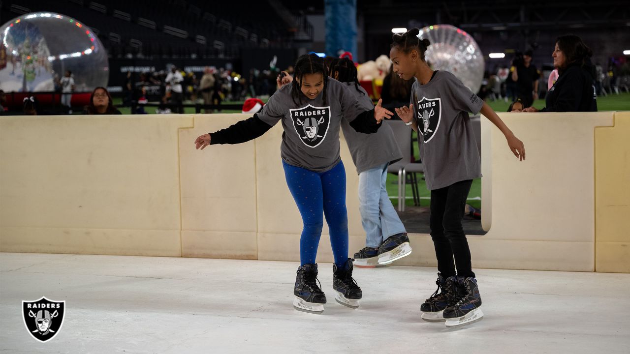 Photos: Youth Holiday Party at Allegiant Stadium