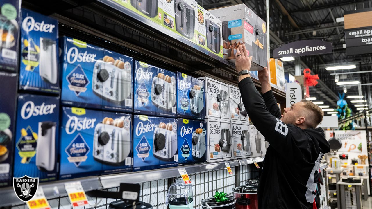 Photos: Raiders go shopping with community members