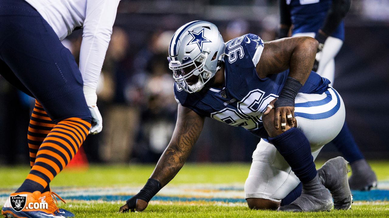 Las Vegas Raiders defensive tackle Maliek Collins (97) stretches