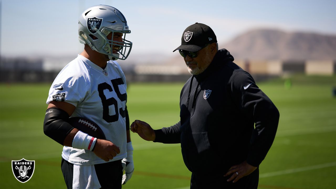 Las Vegas Raiders running back coach Kennedy Polamalu gives an