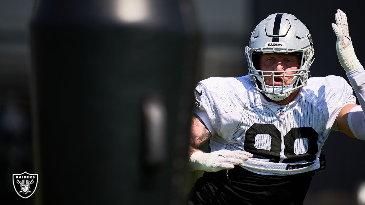 Las Vegas Raiders defensive end Maxx Crosby (98) looks on from