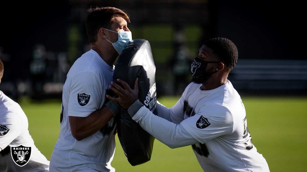 Raiders linebacker Tanner Muse (55) runs through drills during NFL