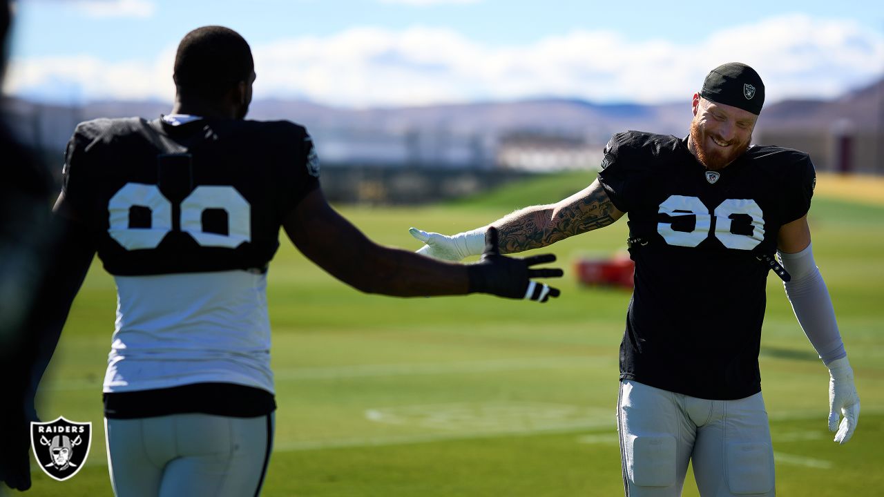 Raiders defensive end Clelin Ferrell (99) works through the tackle posts  during a practice sess …