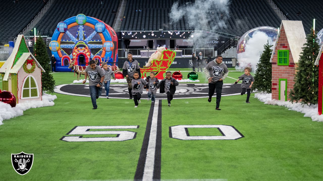 Photos: Youth Holiday Party at Allegiant Stadium