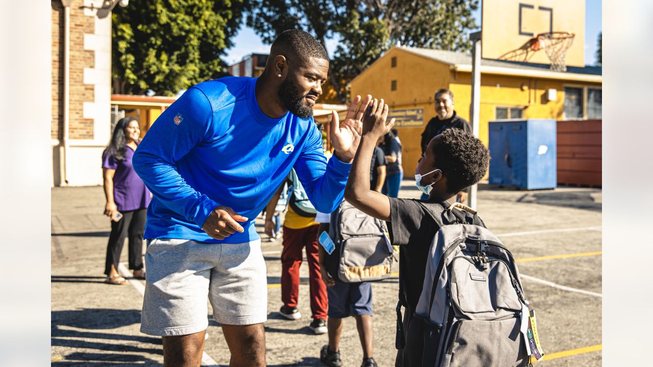 Terrell Burgess helped distribute school supplies at LA elementary