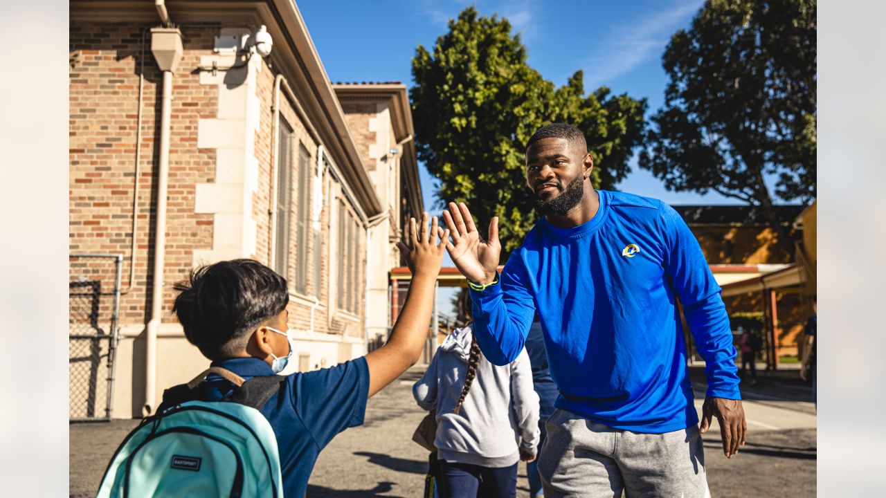 Terrell Burgess helped distribute school supplies at LA elementary