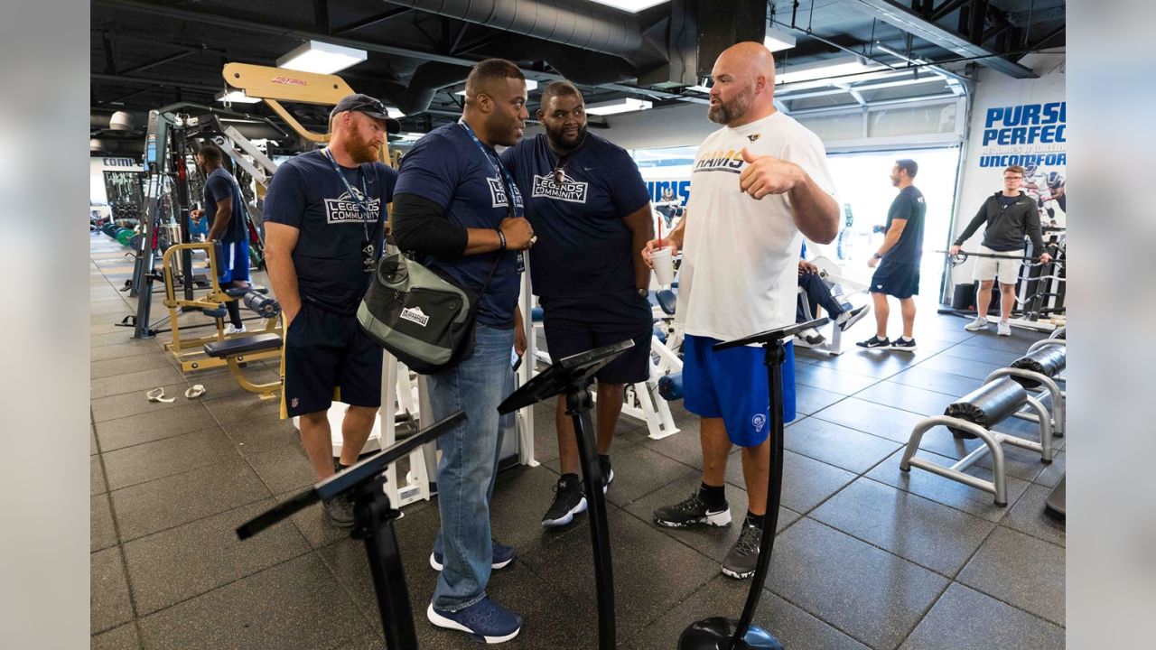 St. Louis Rams wide receiver Torry Holt, right, congratulates rookie wide  receiver Kelvin Kight after Kight made a great reception during the Rams'  minicamp Saturday, May 22, 2004, in Earth City, Mo. (