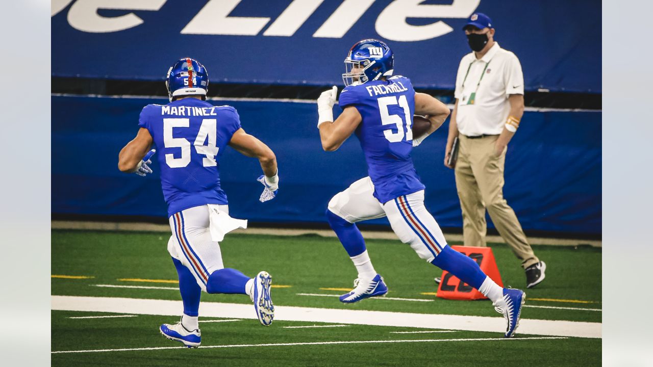 New York Giants inside linebacker Blake Martinez, left, intercepts