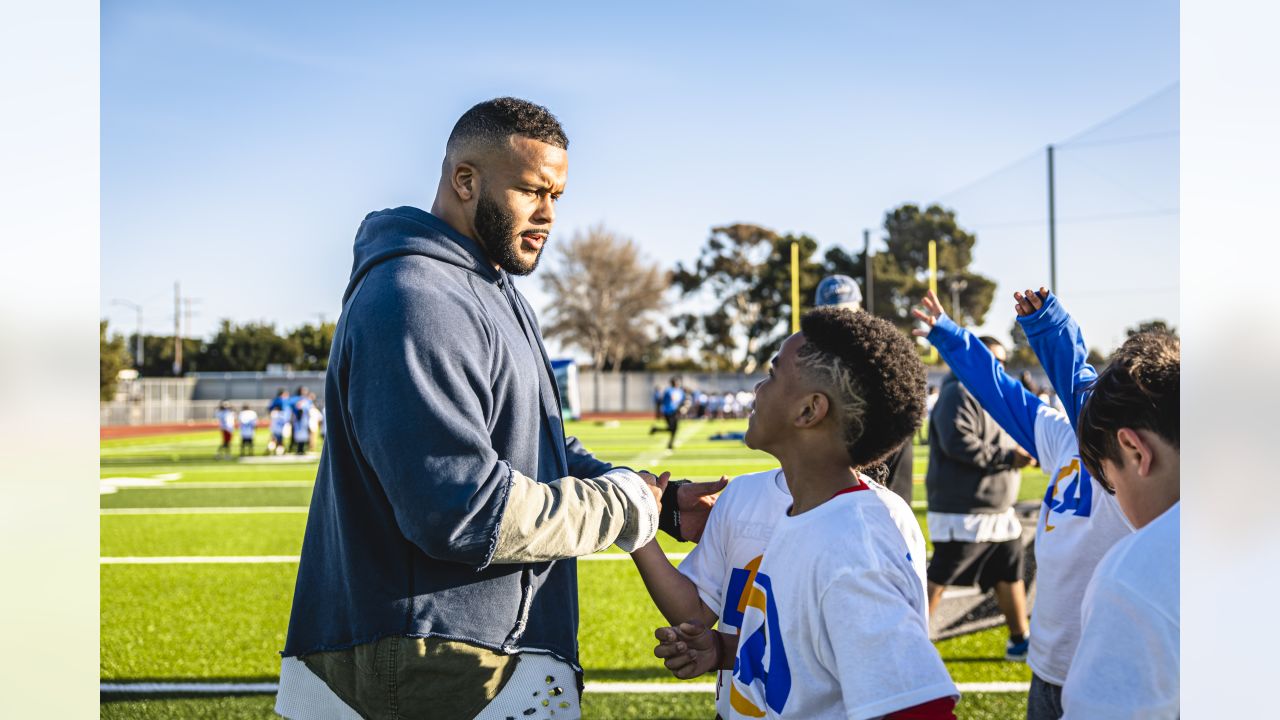 Aaron Donald hosts football camp for local youth at Dymally High School in  celebration of football field reopening