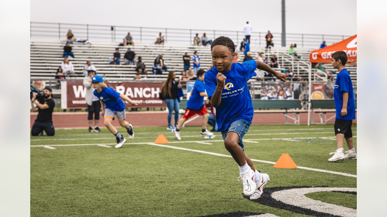 COMMUNITY PHOTOS: Puka Nacua, Davis Allen & more rookies coach LA kids at  Rams football camp