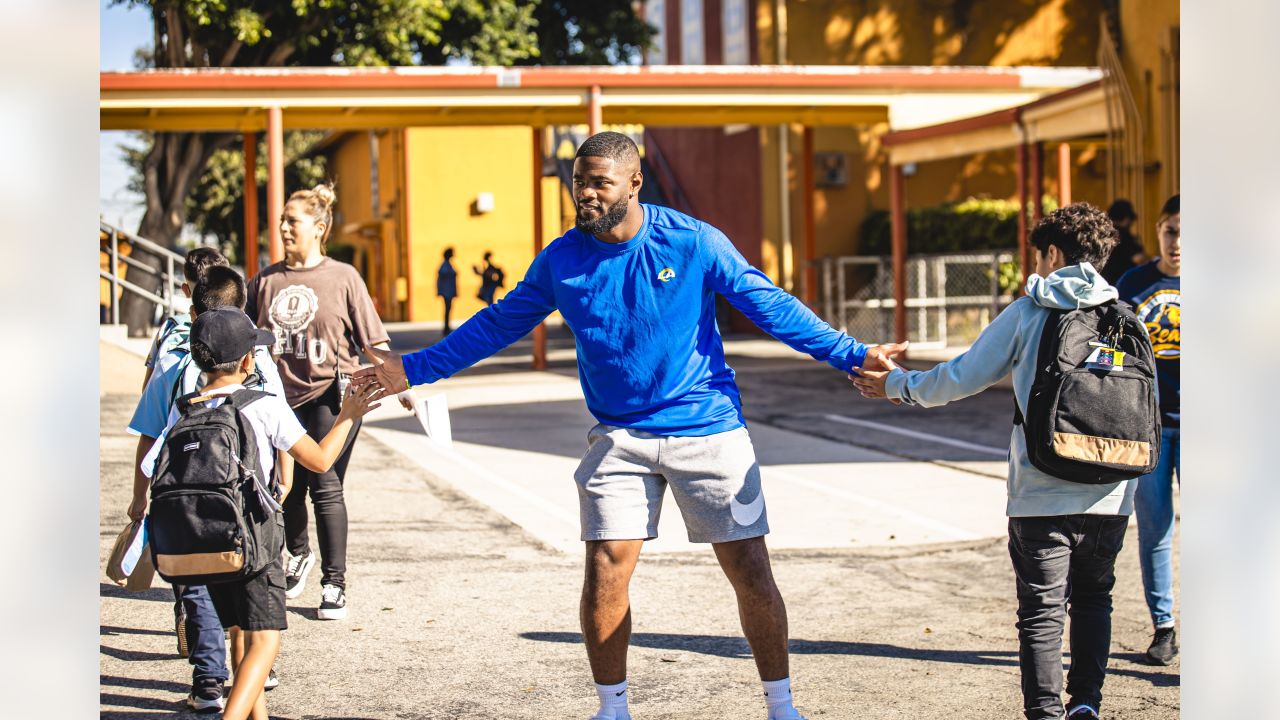 Terrell Burgess helped distribute school supplies at LA elementary