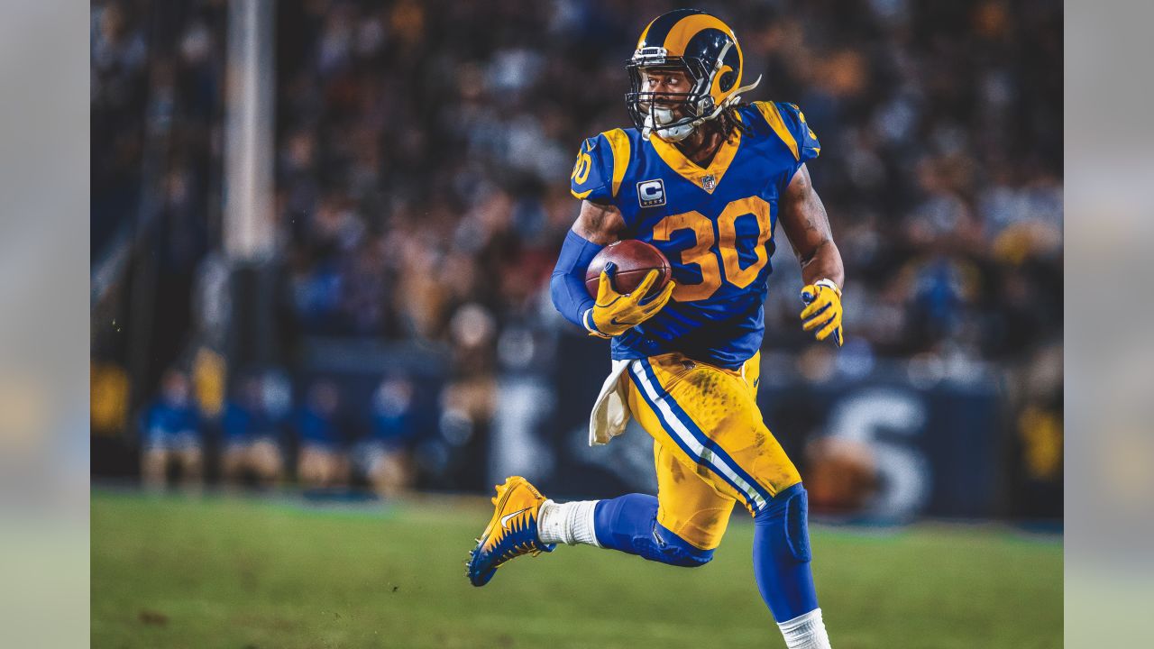 Los Angeles Rams running back Todd Gurley scores past Dallas Cowboys  cornerback Chidobe Awuzie during the first half in an NFL divisional  football playoff game Saturday, Jan. 12, 2019, in Los Ange …