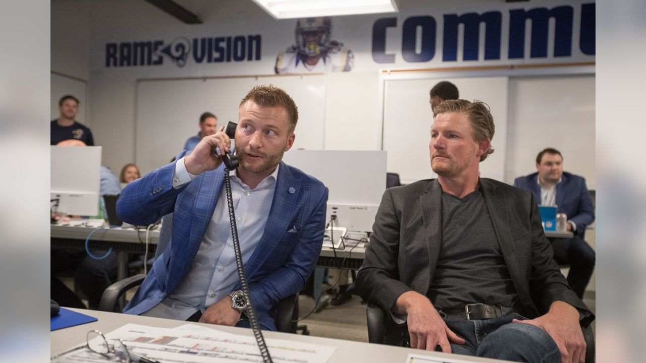 Sean McVay works the phone in the Rams' Draft War Room with GM Les Snead