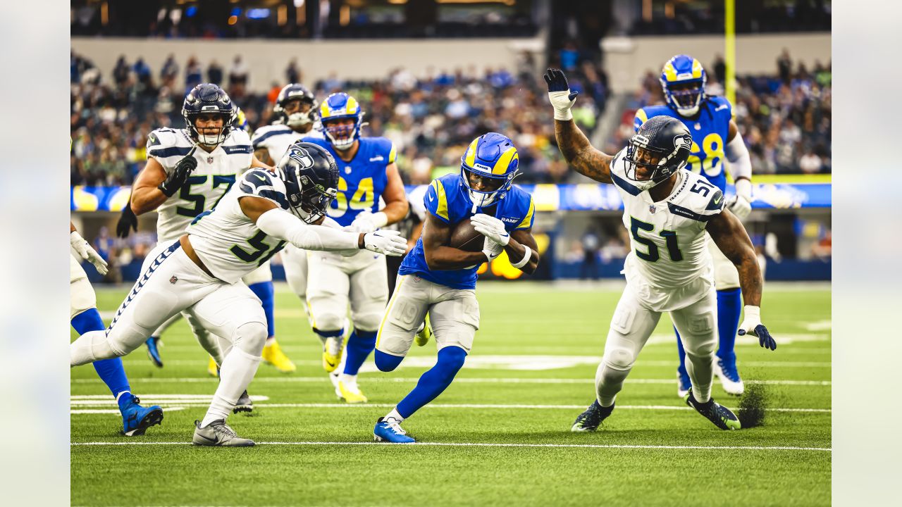 Seattle Seahawks Vs. Los Angeles Rams. Fans Support On NFL Game. Silhouette  Of Supporters, Big Screen With Two Rivals In Background. Stock Photo,  Picture And Royalty Free Image. Image 151158439.