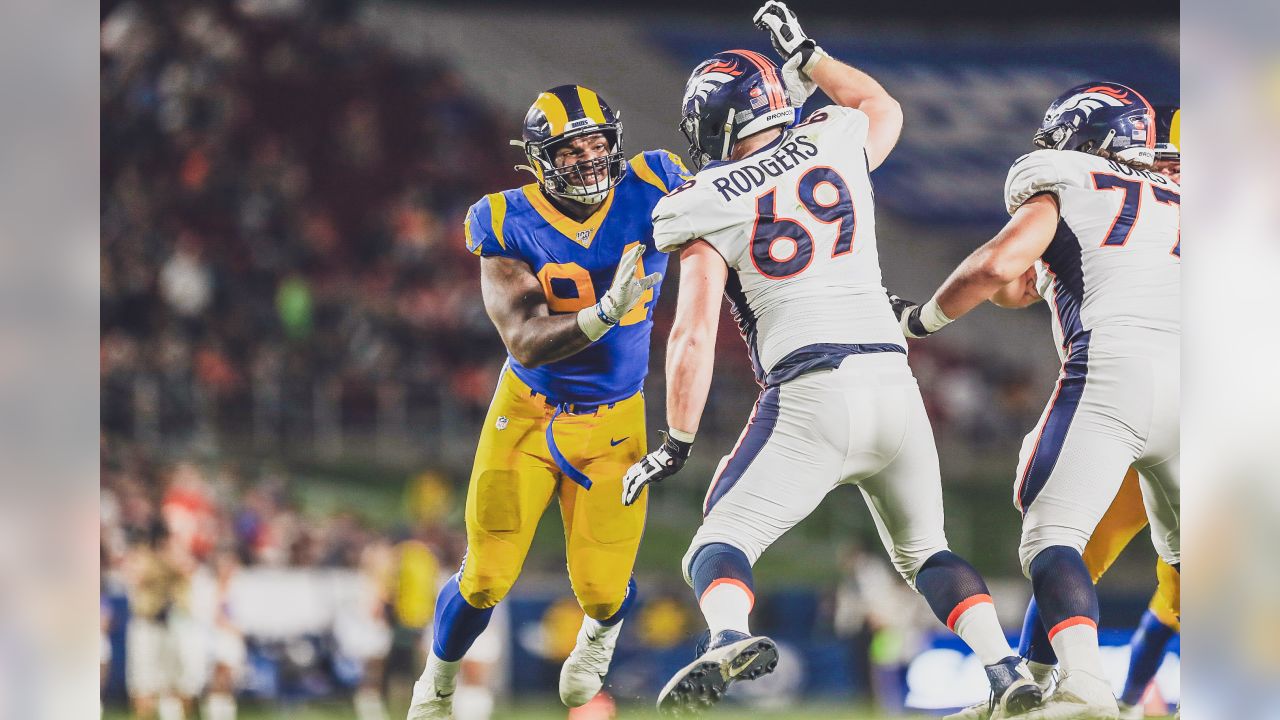 Denver Broncos running back Damarea Crockett (39) is tackled against the  Los Angeles Rams during the