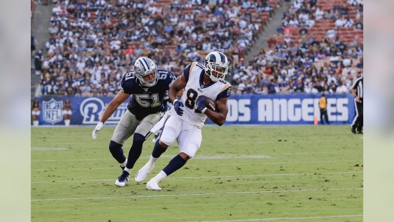 Los Angeles Rams running back Todd Gurley scores past Dallas Cowboys  cornerback Chidobe Awuzie during the first half in an NFL divisional  football playoff game Saturday, Jan. 12, 2019, in Los Ange …