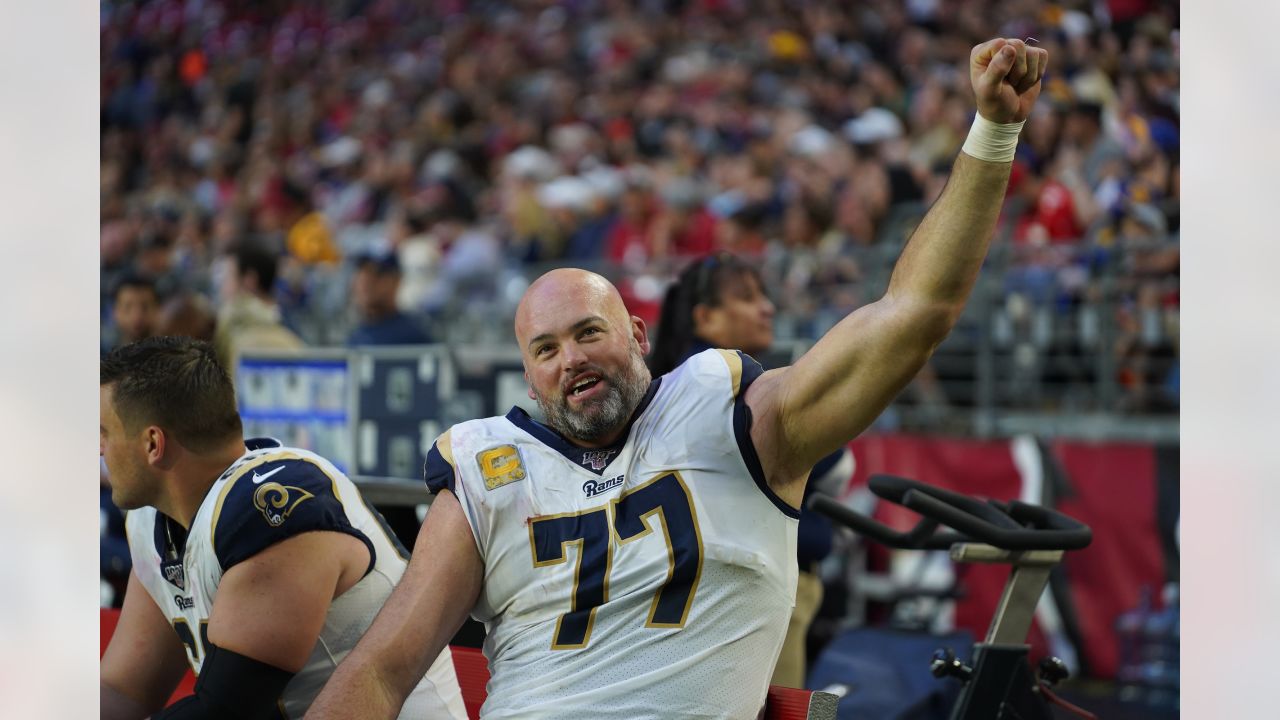 Los Angeles Rams offensive lineman Andrew Whitworth holds up the Vince  Lombardi Super Bowl trophy during the team's victory parade in Los Angeles,  Wednesday, Feb. 16, 2022, following their win Sunday over