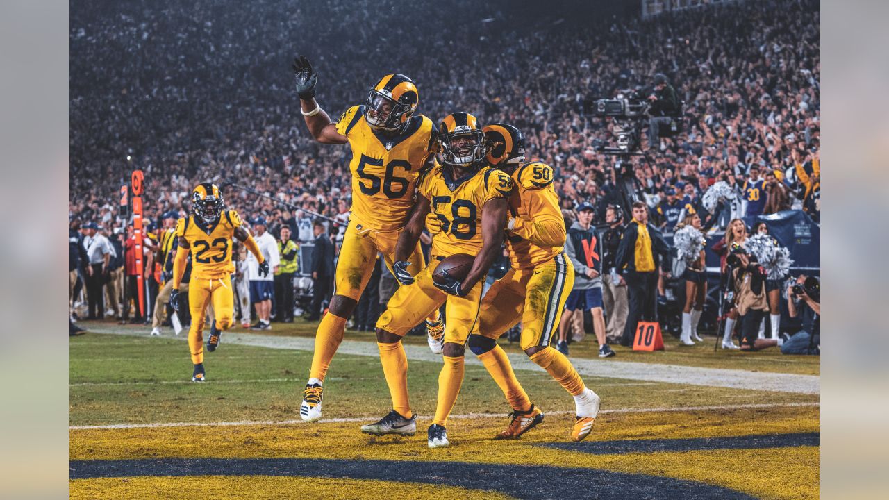 Los Angeles Rams defensive end John Franklin-Myers (94) lines up with  defensive end Aaron Donald (99) and nose tackle Ndamukong Suh (93) during  the first half in an NFL football game Sunday