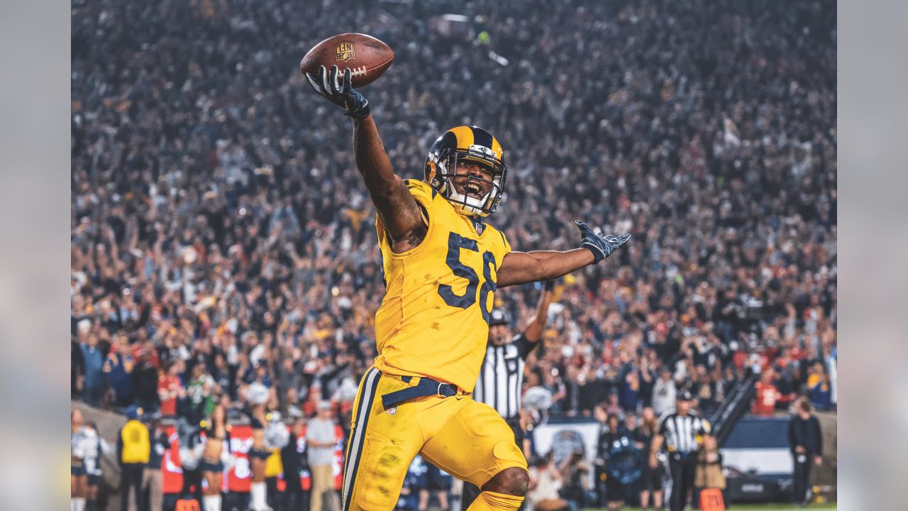 Los Angeles Rams defensive end Aaron Donald (99) celebrates a defensive  stop with defensive tackle Sebastian Joseph-Day (69) during the second half  of an NFL football game against the Tampa Bay Buccaneers