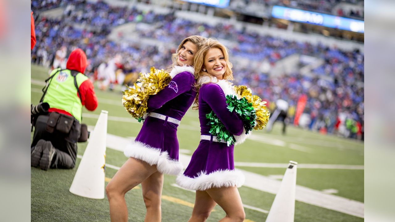 Photo: Ravens cheerleaders in holiday outfits perform against