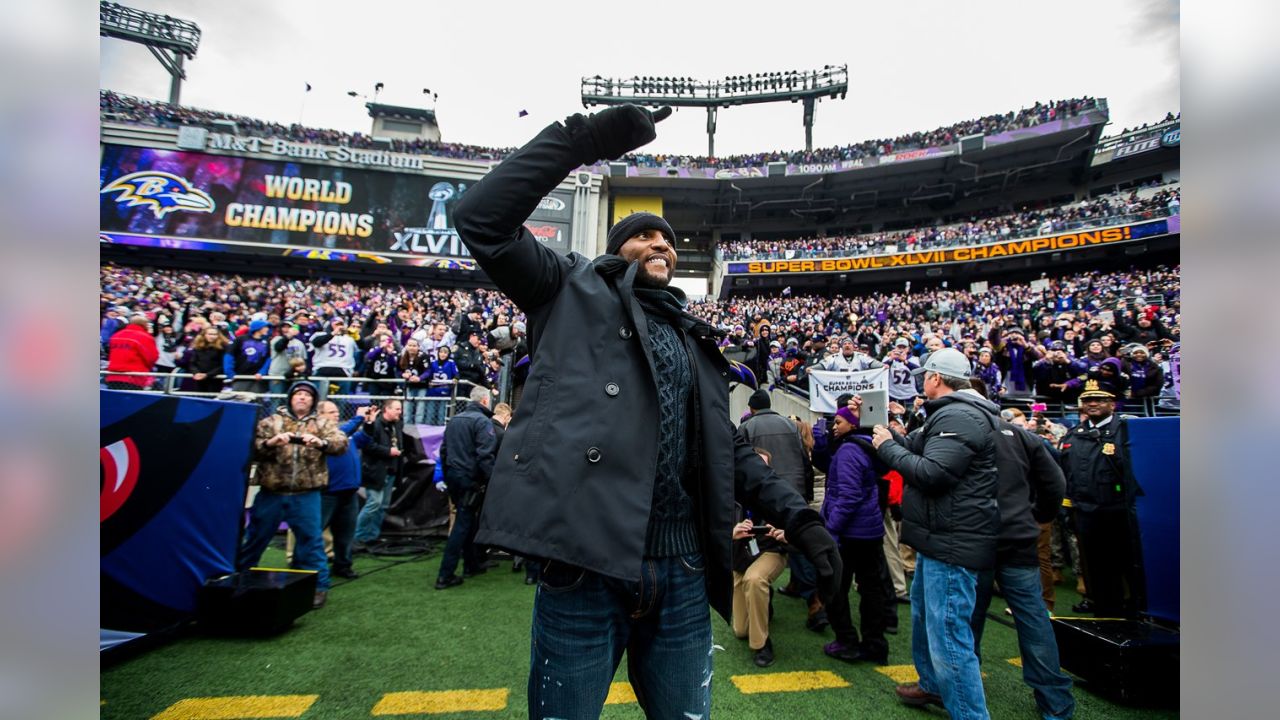 Fans march with Baltimore Ravens' parade to packed stadium - Sports  Illustrated