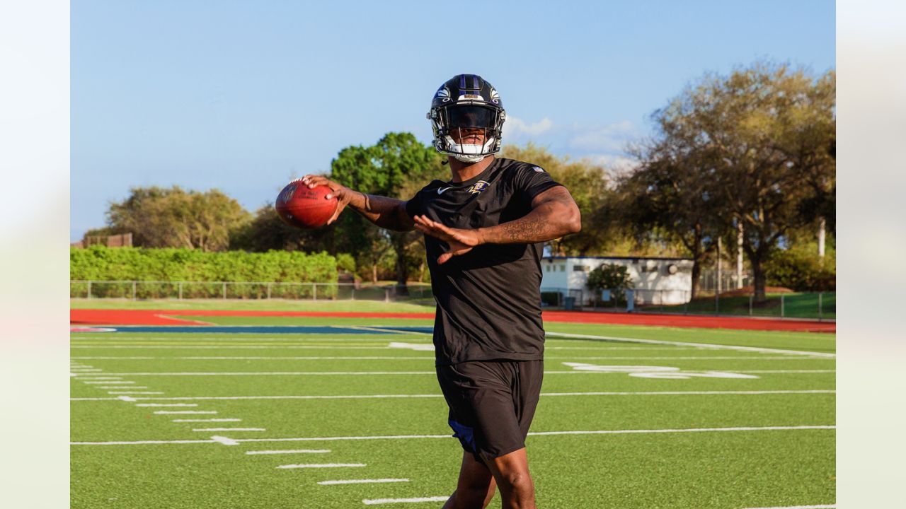 What Pros Wear: Lamar Jackson's Violet Iridium Oakley Visor - What Pros Wear