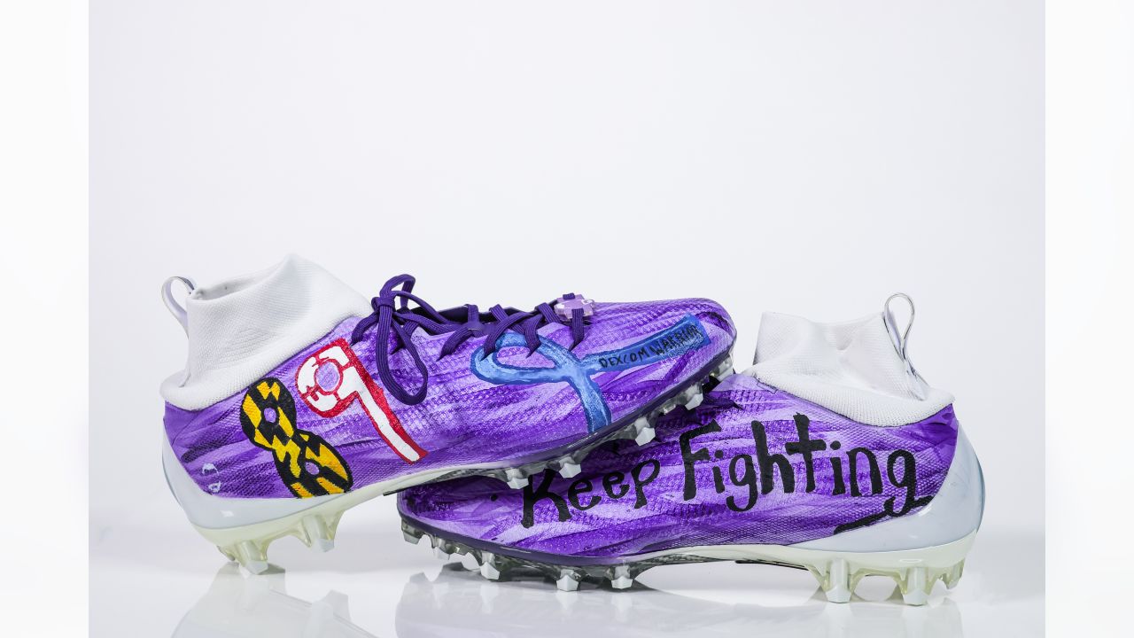 Baltimore Ravens center Tyler Linderbaum (64) shows support for his chosen  charity on his cleats, as part of the NFL's My Cause My Cleats initiative,  during warm-ups ahead of an NFL football