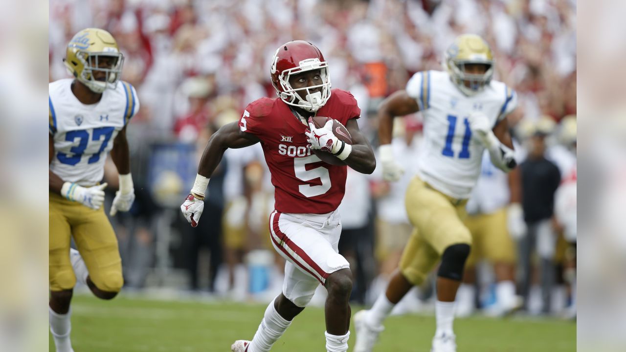 Marquise Brown of the Baltimore Ravens smiles as he runs off the News  Photo - Getty Images