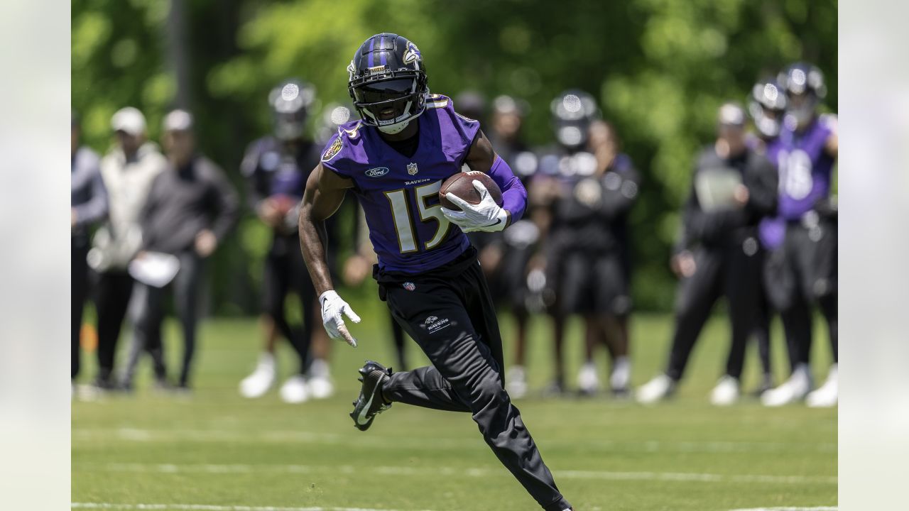 Baltimore Ravens center Sam Mustipher (61) pulls as he blocks