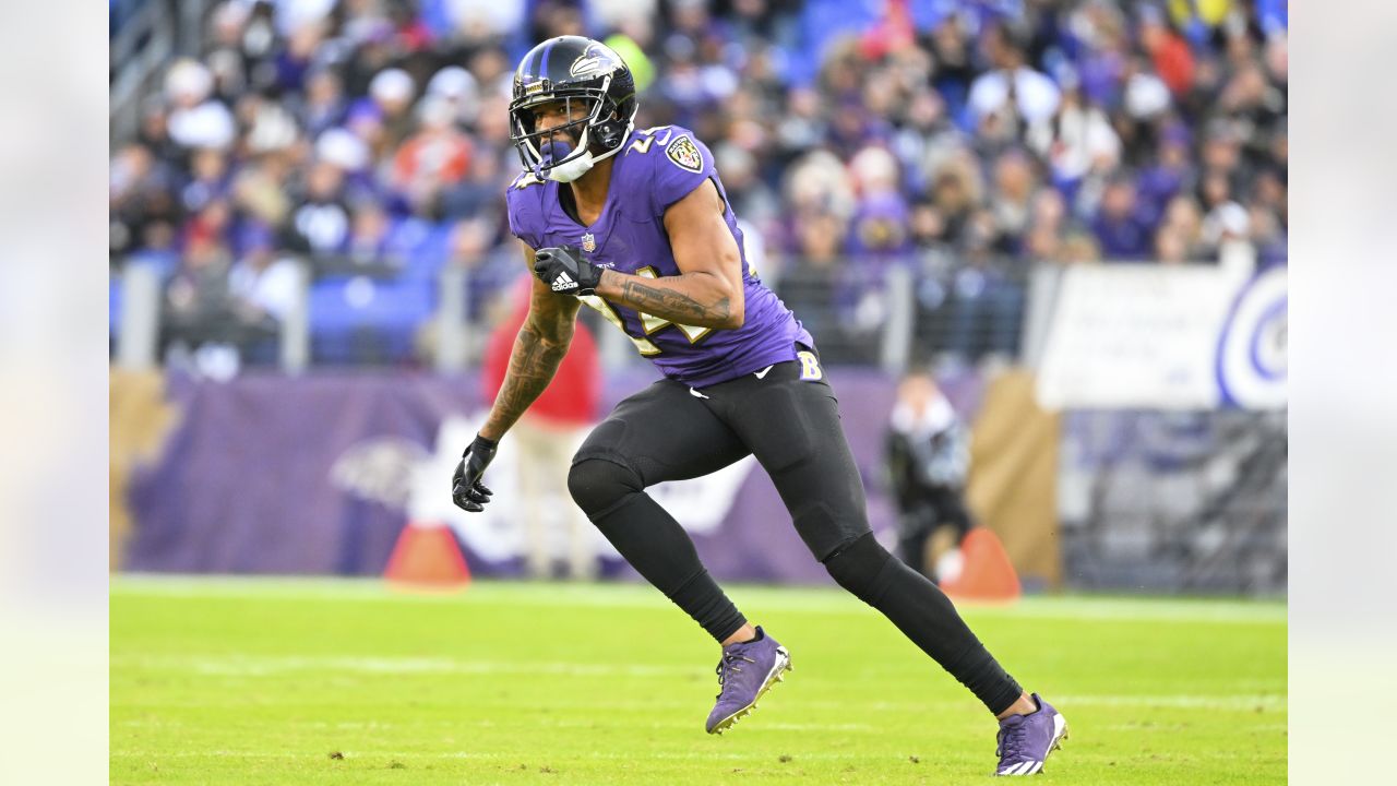 Baltimore Ravens cornerback Marcus Peters (24) looks on during pre-game  warm-ups before an NFL football game against the Carolina Panthers, Sunday,  Nov. 20, 2022, in Baltimore. (AP Photo/Terrance Williams Stock Photo 