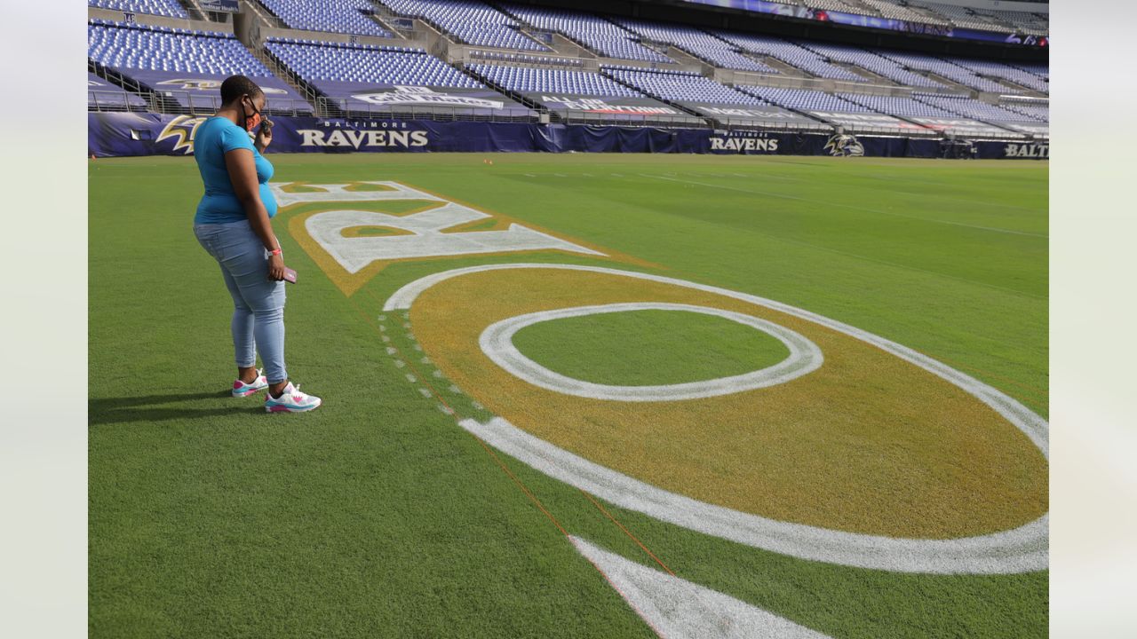 Why Baltimore Ravens' end zone has 'MO' painted in purple 