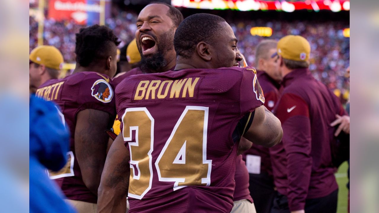 SEP 23, 2012 : Washington Redskins inside linebacker London Fletcher (59)  just misses a pick during the matchup between the Cincinnati Bengals and  the Washington Redskins at FedEx Field in Landover, MD. (