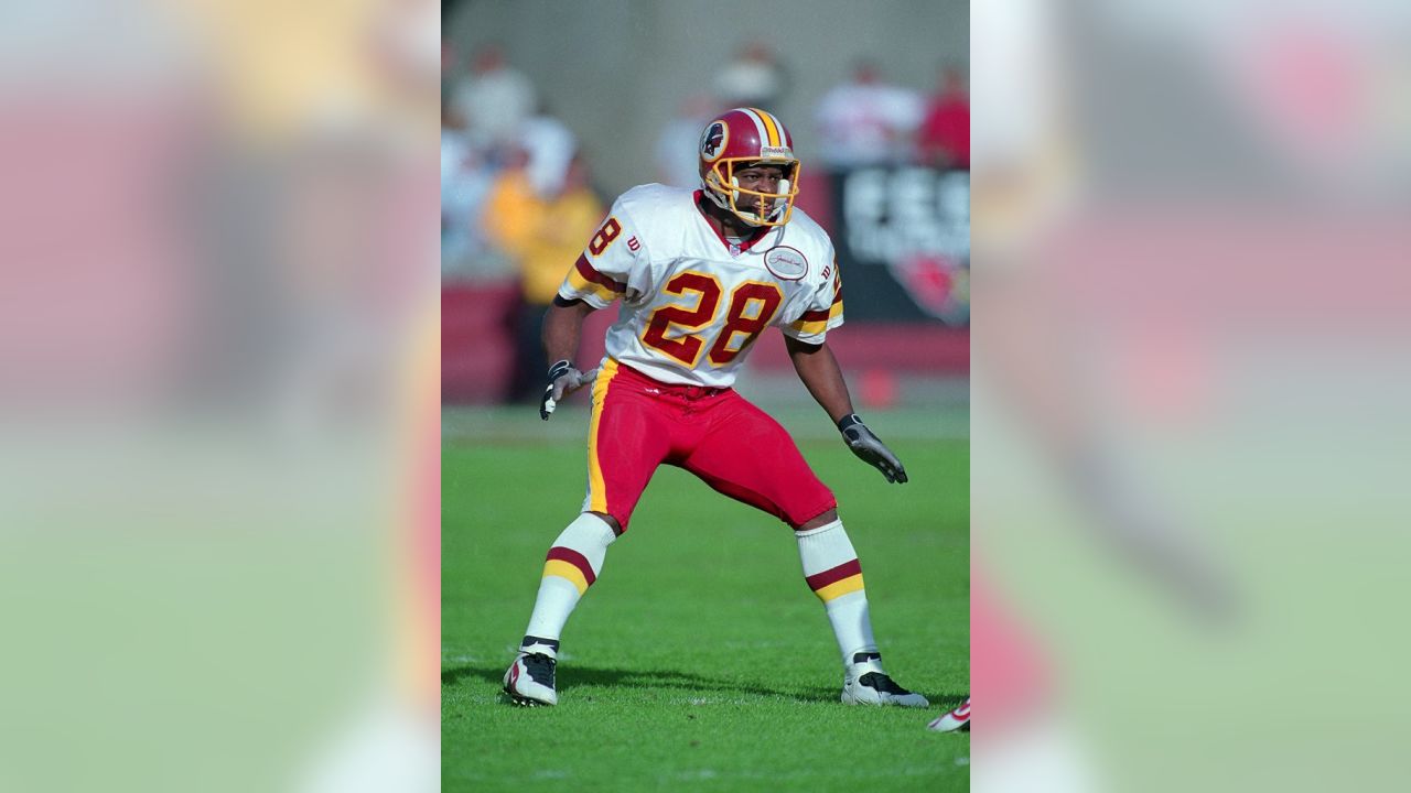 FILE **Washington Redskins' Darrell Green (28) waves to the crowd