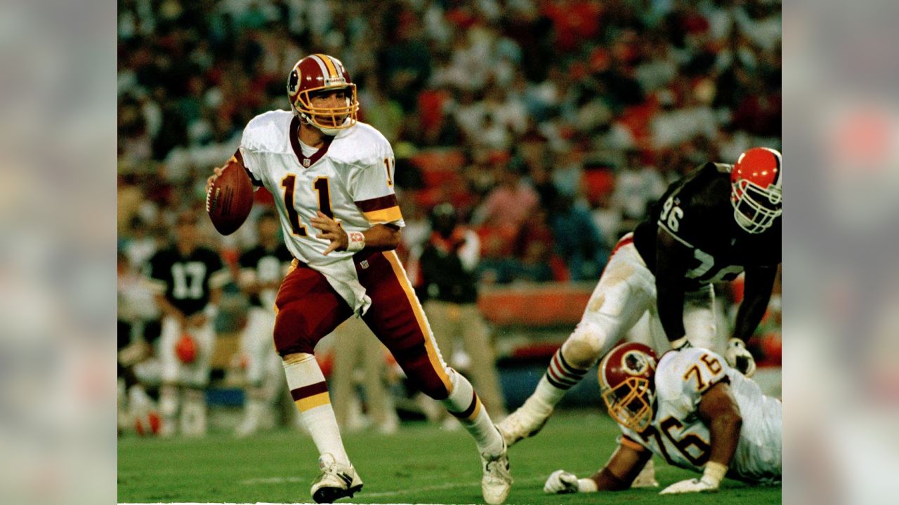 Washington Redskins Stephen Bowen celebrates with Barry Cofield