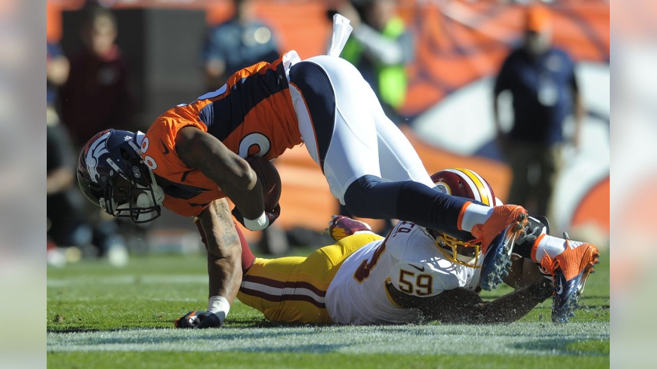 Washington Redskins linebacker London Fletcher (59) argues a