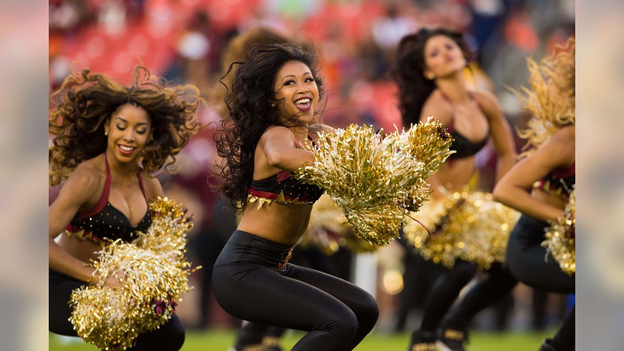 Washington Football Team cheerleader perform during the preseason